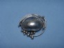sterling silver pin combined with mother of pearl