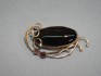 sterling silver pin combined with black onex