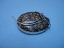 sterling silver pin combined with leopard