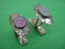 sterling silver cufflink combined with roman glas