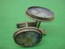 sterling silver cufflink combined with roman glas